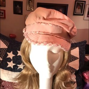 Pink newsboy cap with pink and white piping